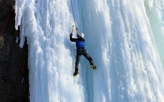 Ice-climbing at the waterfall in Obertauern, Austria